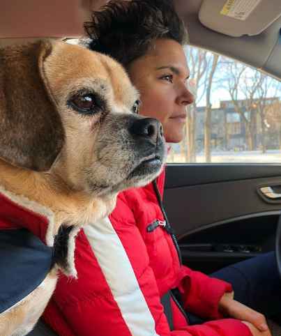 Kate Fagan in her car with her dog. net worth, earning, income